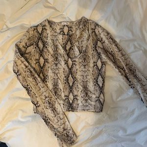 Snakeskin cutout long sleeve going out crop top